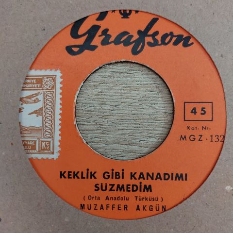 MUZAFFER AKGÜN - KEKLİK GİBİ KANADIMI SÜZMEDİM 45LİK PLAK