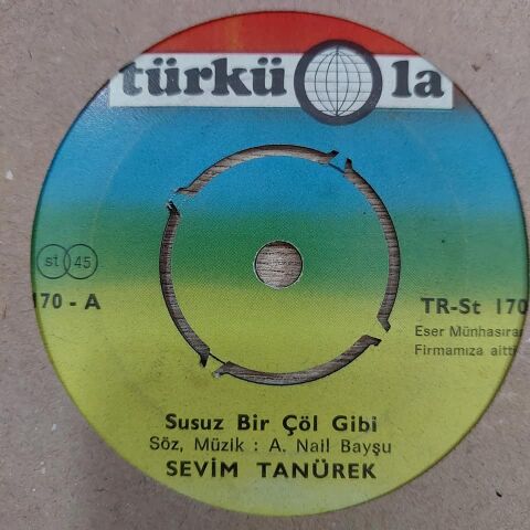 SEVİM TANÜREK - YILLARIN IZDIRAI 45LİK PLAK