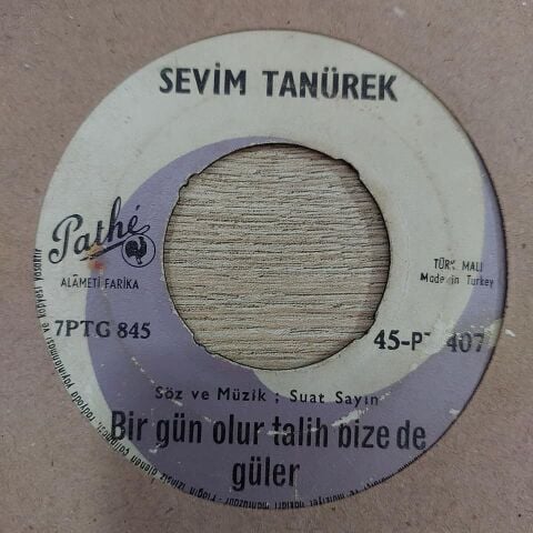 SEVİM TANÜREK - BİR GÜN OLUR TALİH BİZE DE GÜLER 45LİK PLAK
