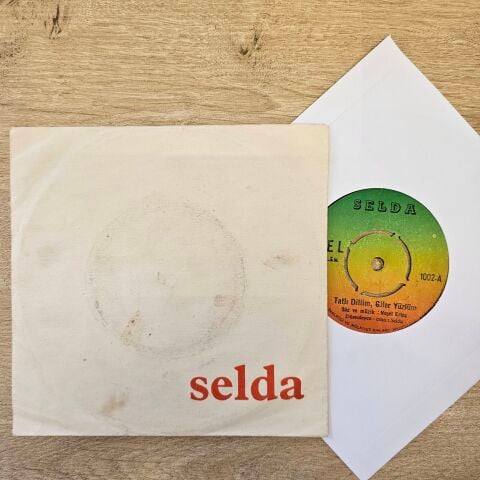 Selda Bağcan– Tatlı Dillim, Güler Yüzlüm / Mahpushanelere Güneş Doğmuyor 45LİK PLAK...