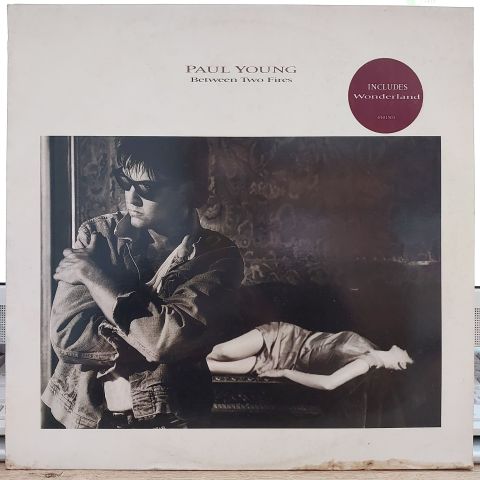 Paul Young – Between Two Fires LP PLAK