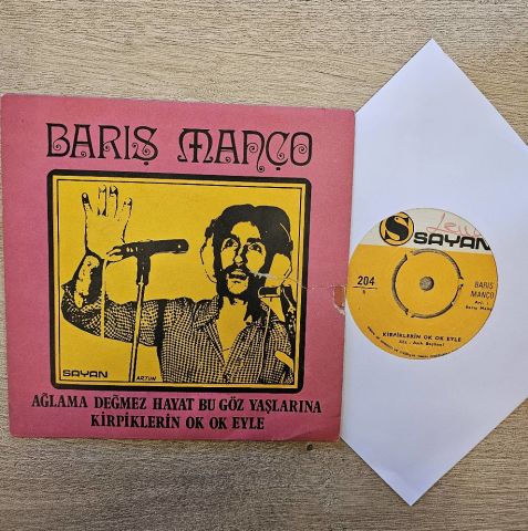 Barış Manço – Ağlama Değmez Hayat Bu Göz Yaşlarına / Kirpiklerin Ok Ok Eyle 45LİK PLAK...