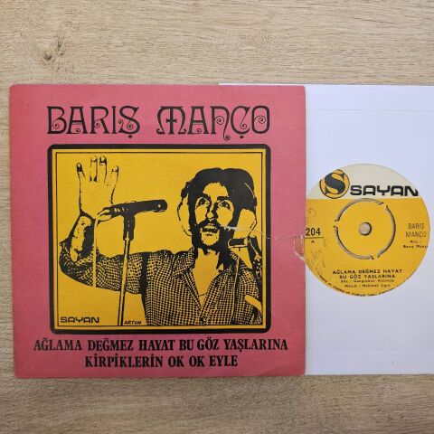 Barış Manço – Ağlama Değmez Hayat Bu Göz Yaşlarına / Kirpiklerin Ok Ok Eyle 45LİK PLAK...